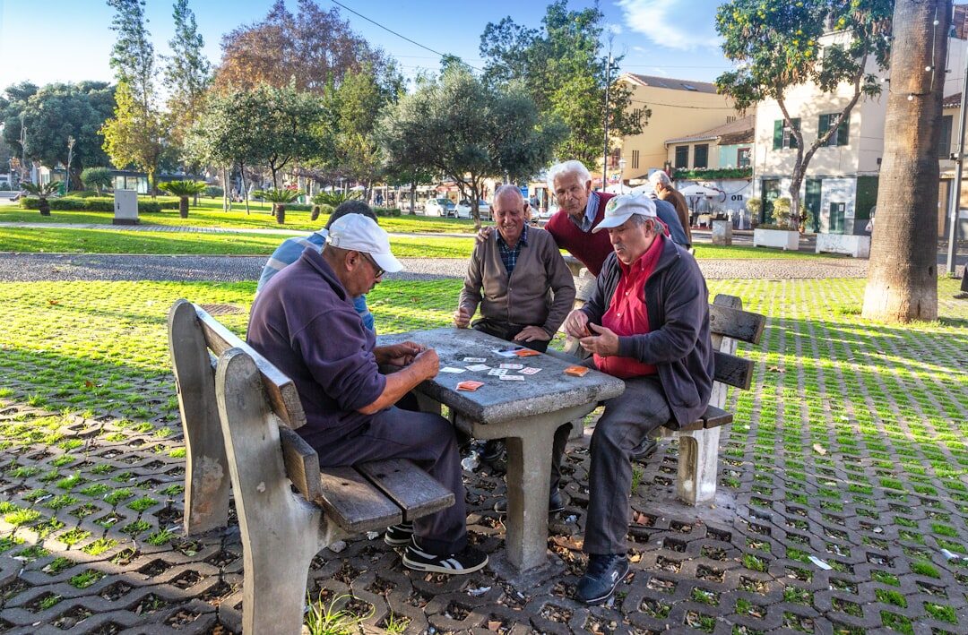 Seniors playing board games at a table