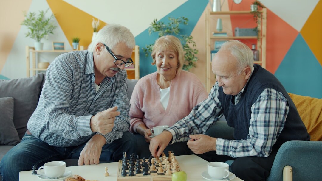 Group of seniors enjoying a community activity indoors